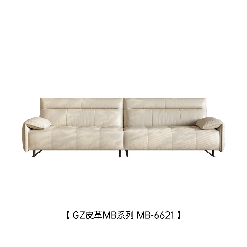 A leather sofa with soft armrests