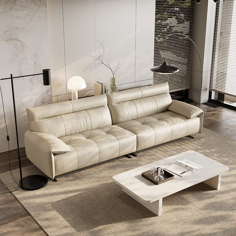 A leather sofa with soft armrests