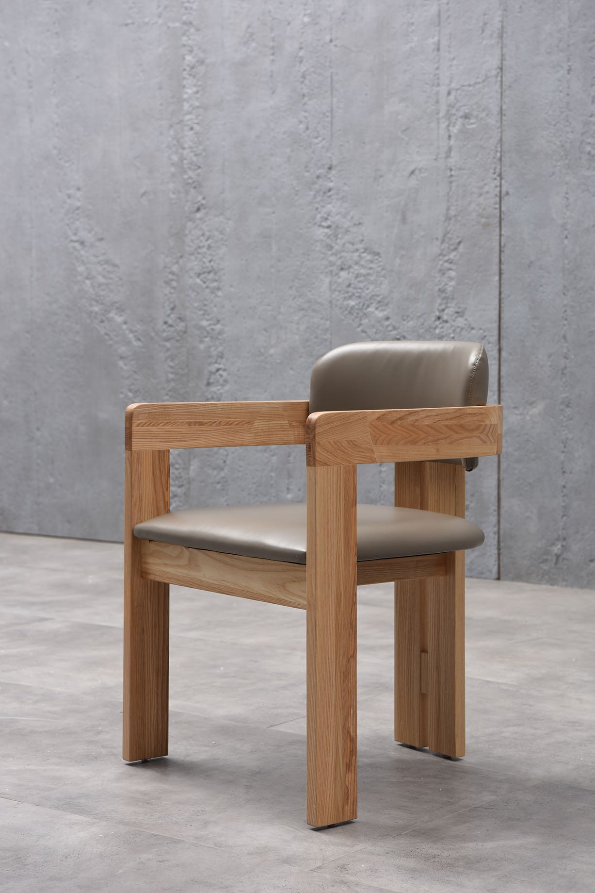 A luxurious solid wood upholstered dining chair