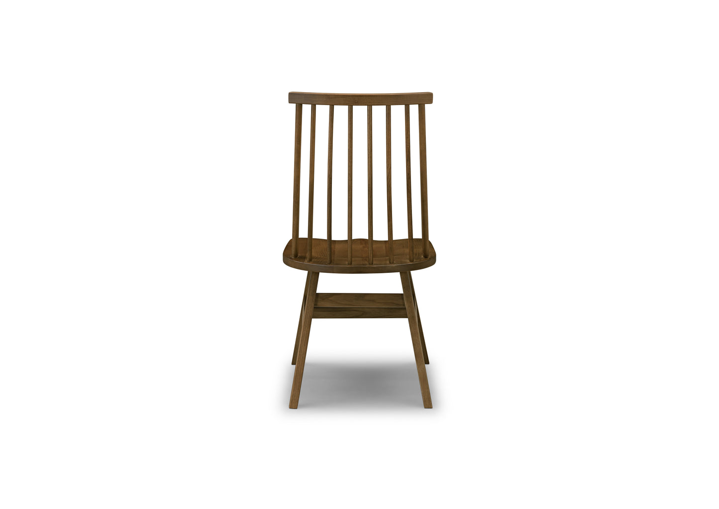 A minimalist soft backed solid wood dining chair