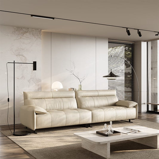 A leather sofa with soft armrests