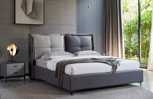 A leathaire bed with a soft back