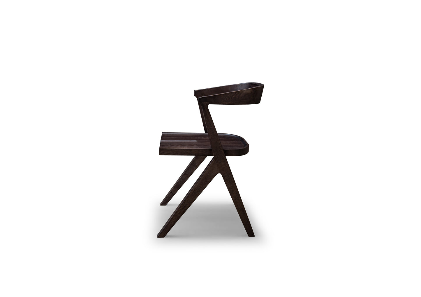 A dining chair made entirely of solid wood with a strong sense of design