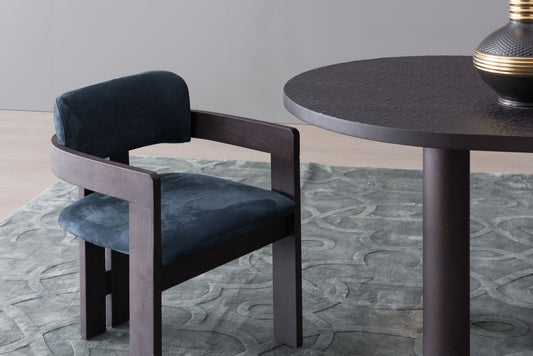 A luxurious solid wood upholstered dining chair