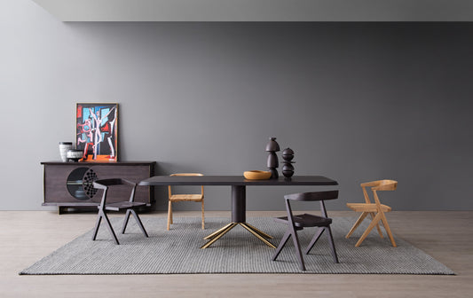 A dining chair made entirely of solid wood with a strong sense of design